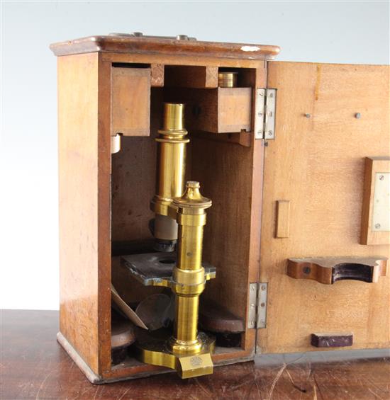 An E.Leitz lacquered brass microscope, case 13in. high ( excluding handle)